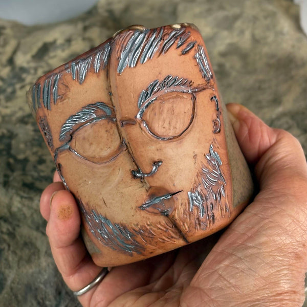 The Man who Observes with Sunglasses