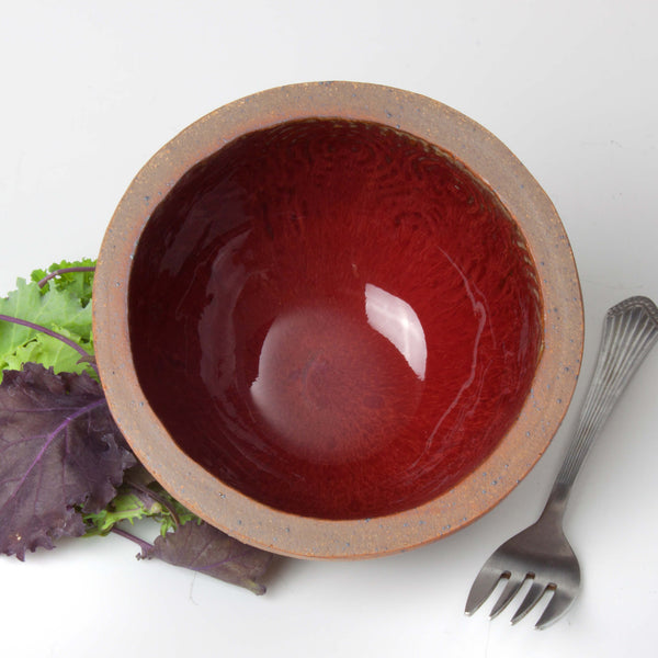 Size: 5" diameter x 3" high Glaze: Ruby Red Hand-built with stoneware clay Food, oven, microwave, and dishwasher safe Buy one, buy a set in assorted glaze colors